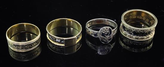 Four 19th century gold and enamel mourning rings,